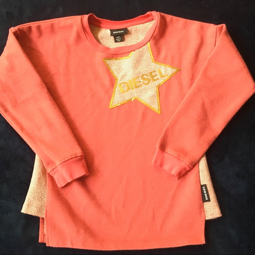 Girls Diesel pink sweatshirt with gold star.